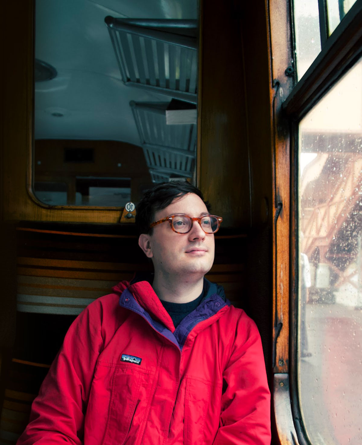 A photo of Matt on a train