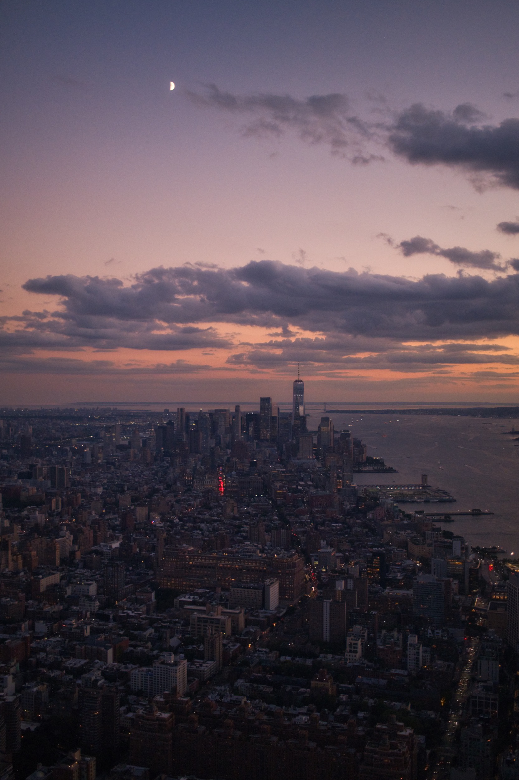 One World Trade Center beneath glowing sunset clouds